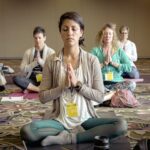 group of women deeply meditating