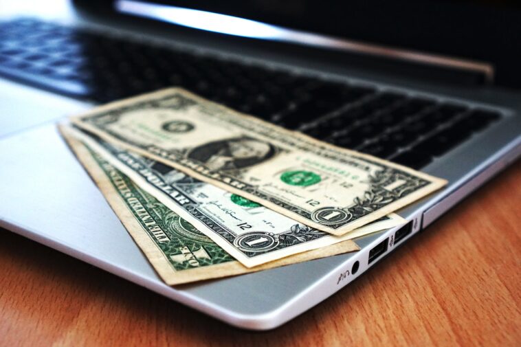 Dollar note on the Laptop