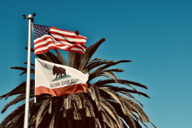 California and US flag on pole