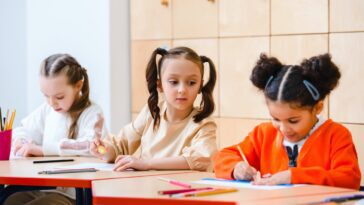 children studying inside a classroom