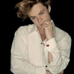 photo of Harrison Gilbertson dressed in a white sleave