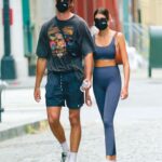 Jacob Elordi and his girlfriend putting on a face mask or nose mask