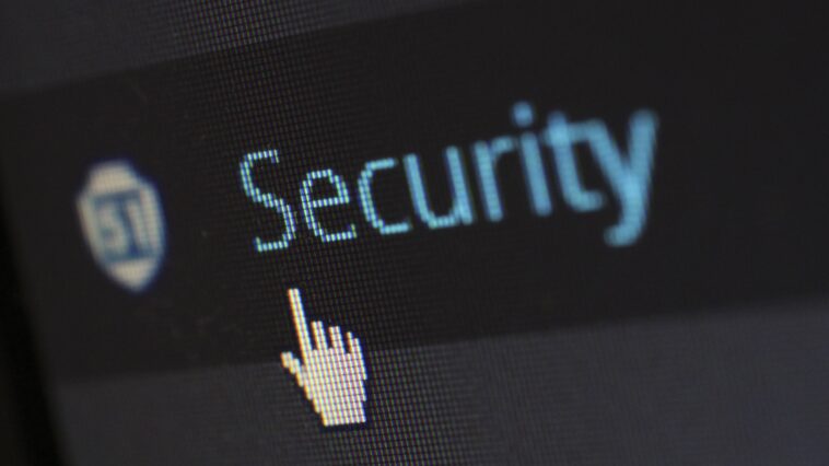 the word security written on a banner with a black background representing Computer Security Software Protection
